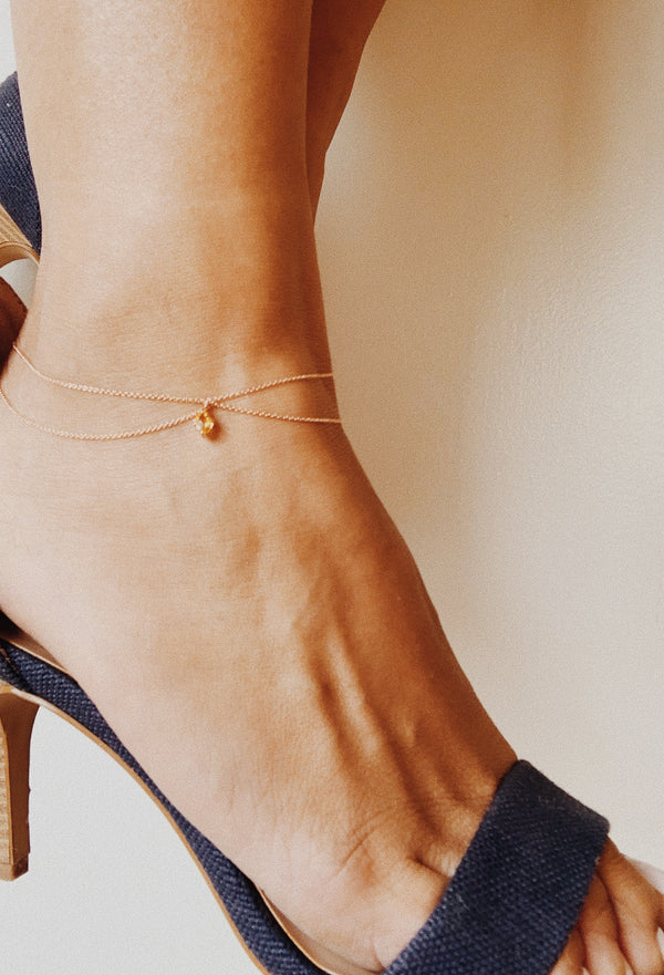 Two layer rose gold chain anklet with marquise shaped yellow sapphire. 